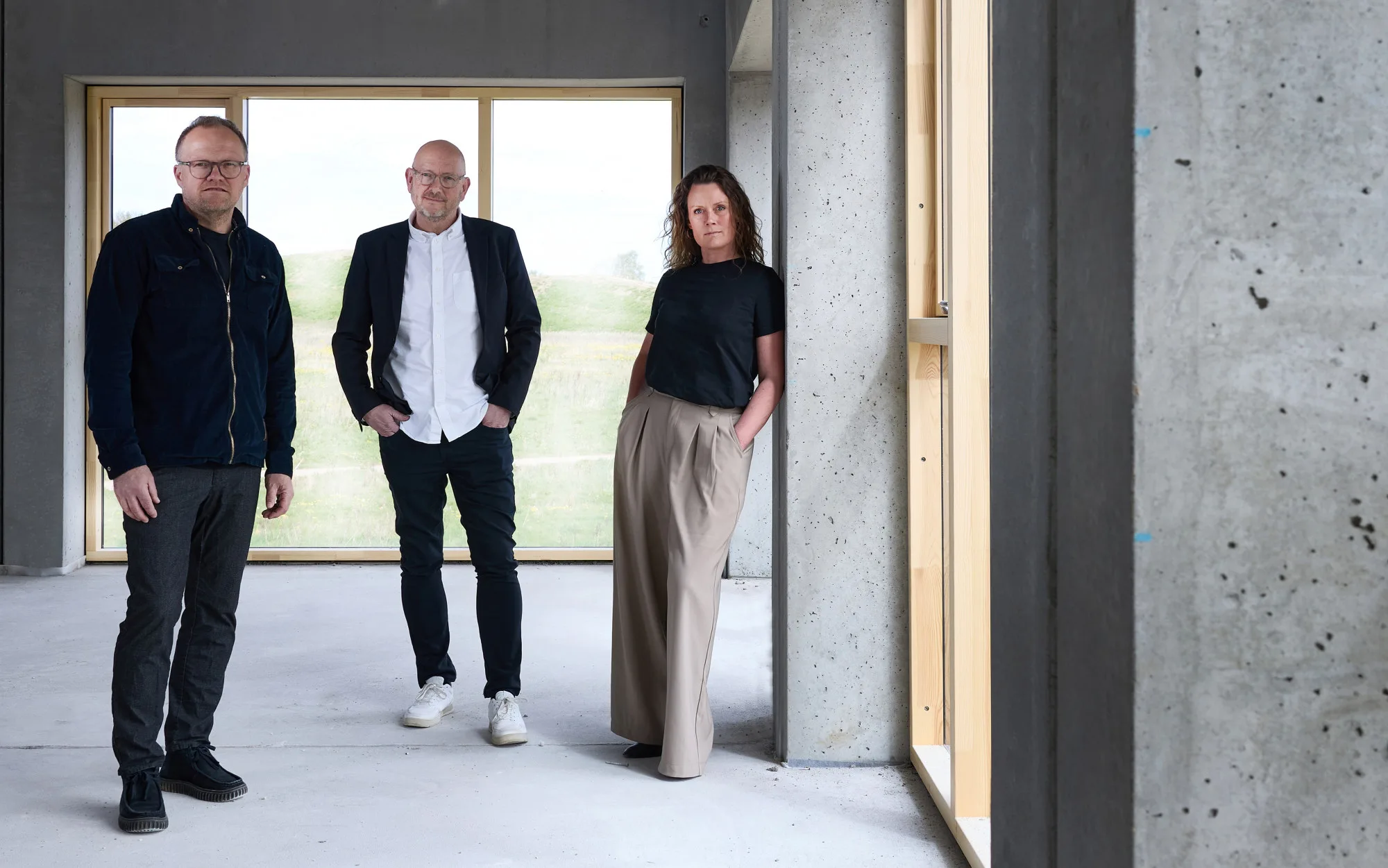 Tre fra Vallentin Haugland i et byggeri under opførelse